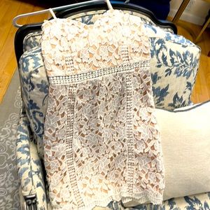 White lace over nude spaghetti strap A-line dress